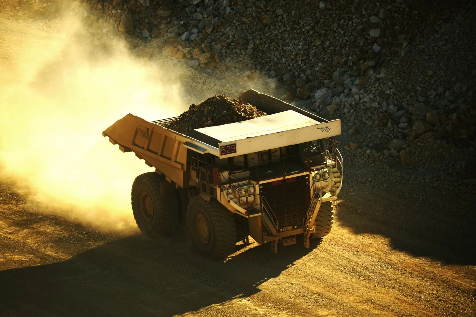 Haul truck working a Ghana mine site at scale