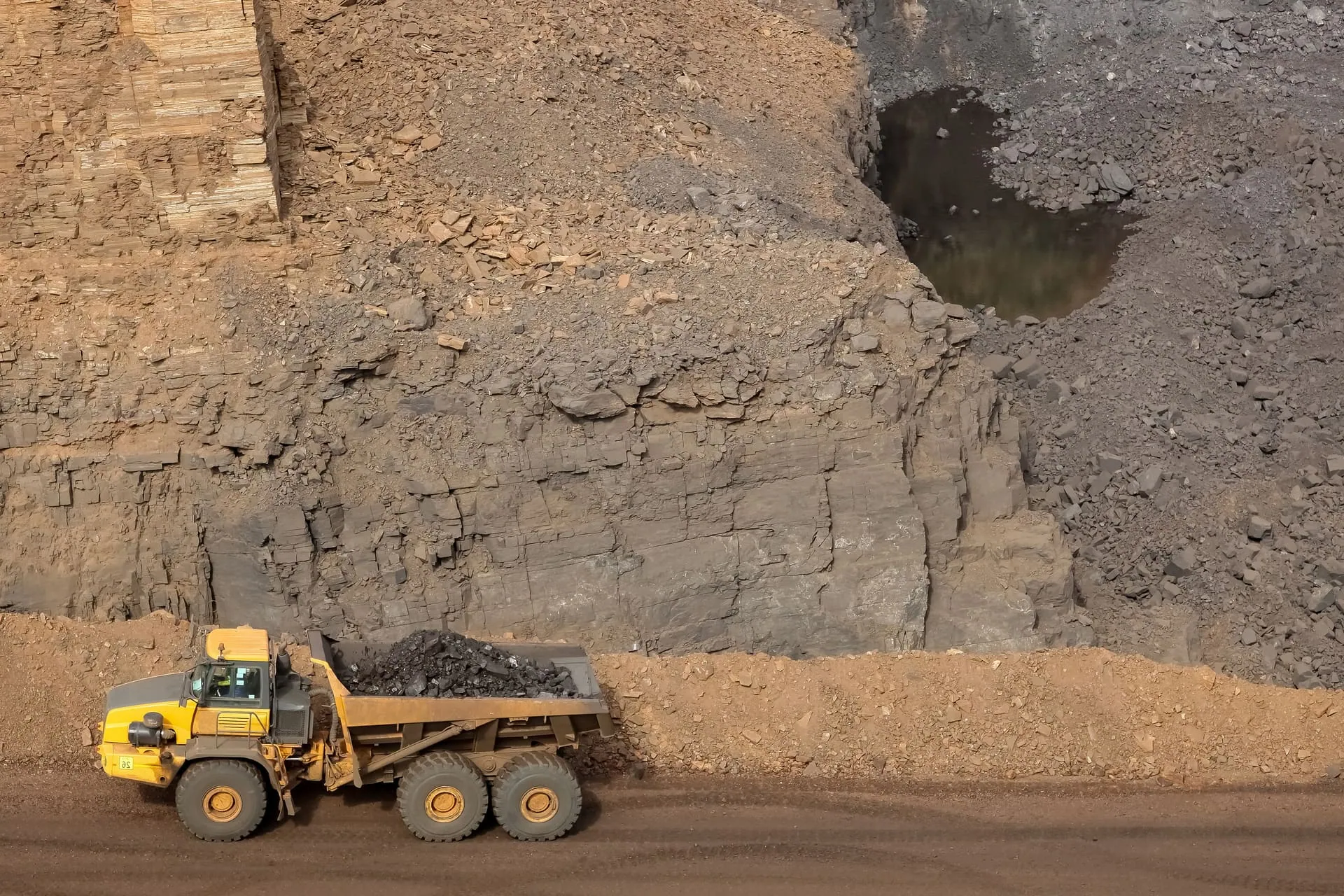 Truck carrying manganese ore from a mining site