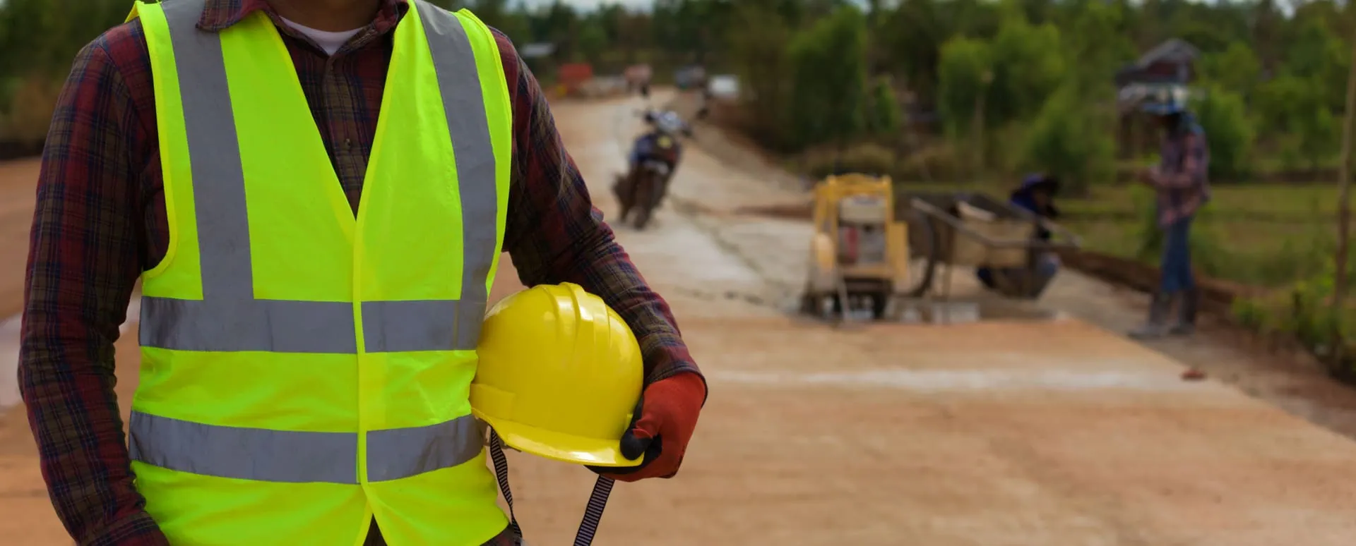 Road construction crew working on a project outdoors