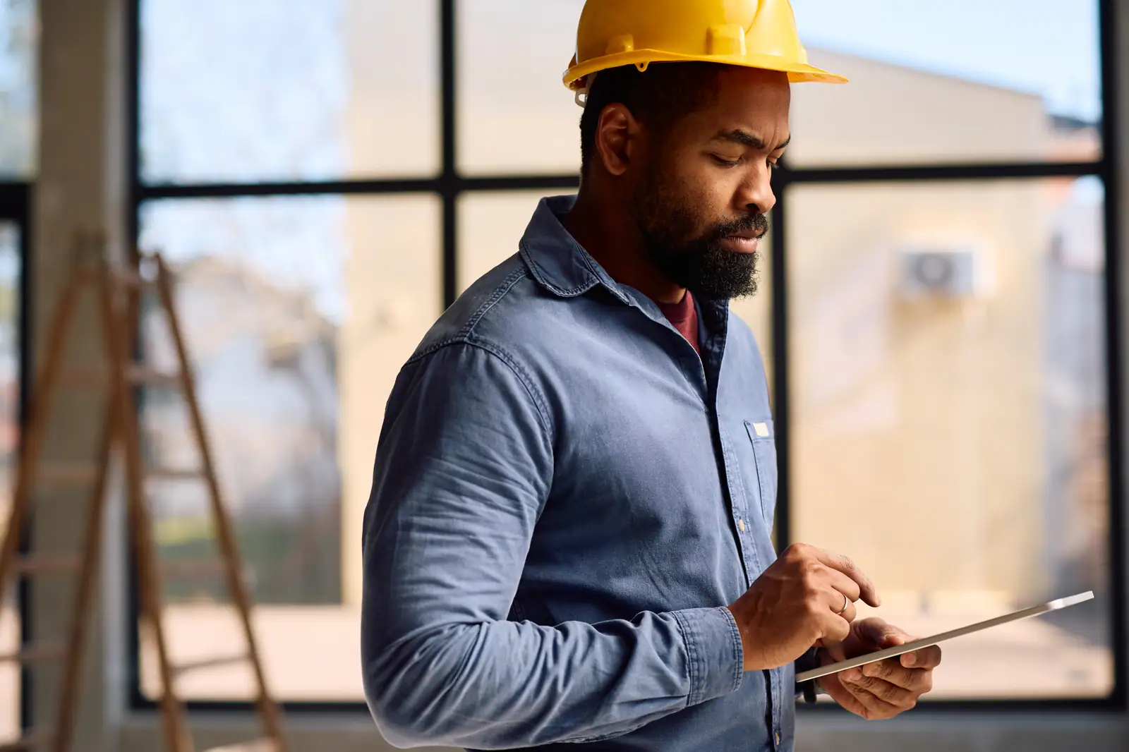 Field worker capturing data on a tablet on site