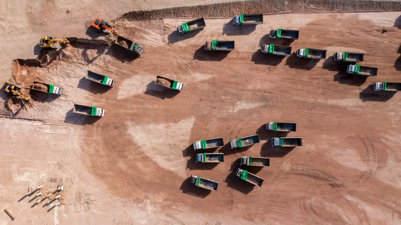 Motor grader shaping a road formation in Ghana