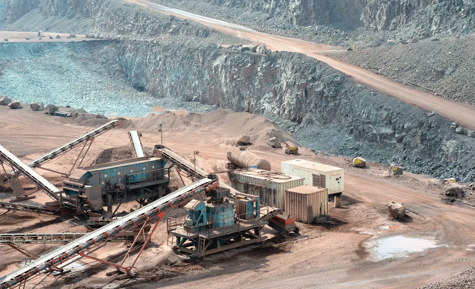 Idle crusher plant at a Ghana quarry during an unplanned stoppage