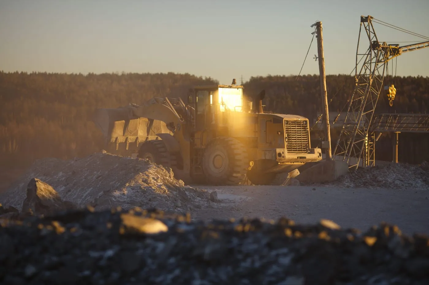 Wheel loader working a Ghana operation at last light