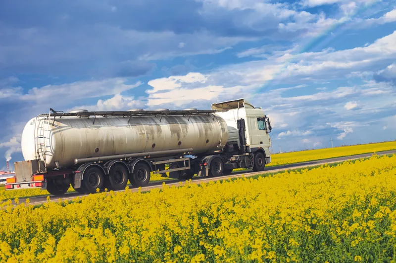 Heavy plant loaded on a low-loader for transport between Ghana sites